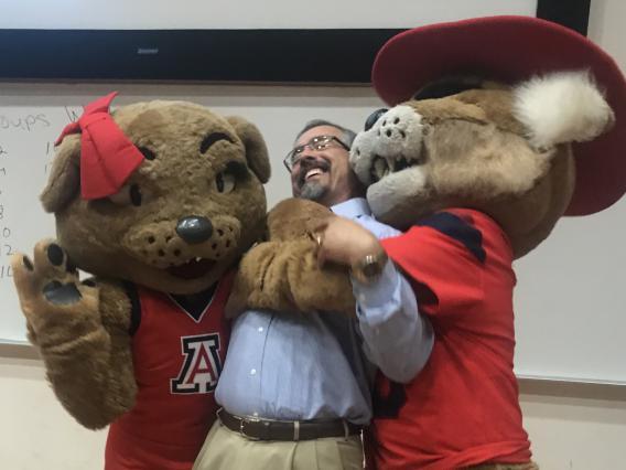 Dr. Torres getting a hug from Wilbur and Wilma!