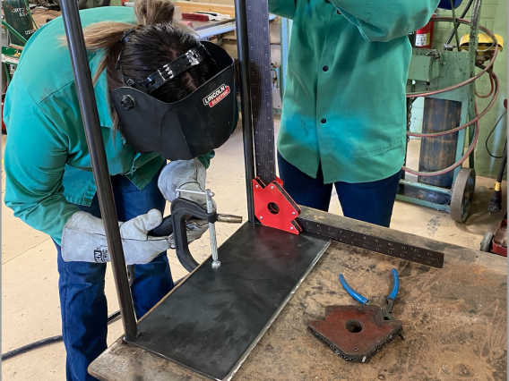 Students welding in an AGTM class. 