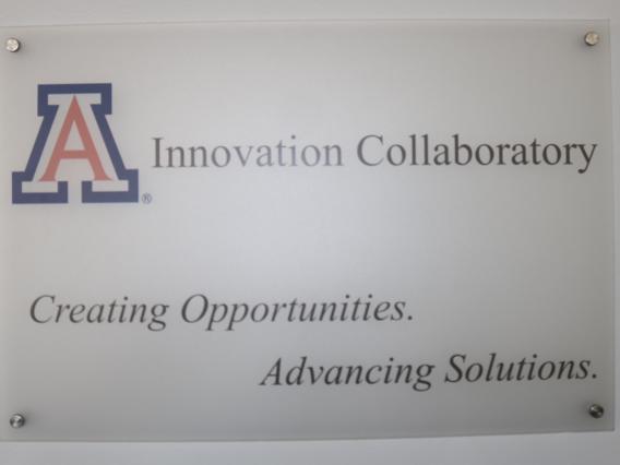 Innovation Collaboratory sign and motto. 